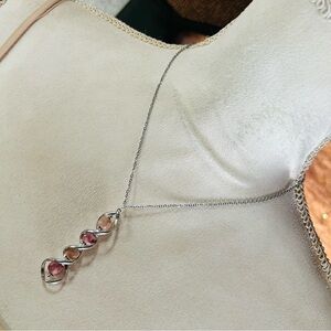 Handcrafted genuine faceted rhodonite twist cage drop pendant on chain necklace